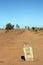 Roadside post marks the way to the river Niger and Timbuktu, Mali