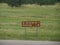 Roadside sign with directions to the Wind Cave National Park and Blue Bell Lodge at Custer State Park