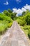 Roadside view of a beautiful park with blue sky ba