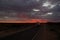 Roadtrain on stuart highway at night. A roadtrain use in remote areas of Australia to move freight efficiently, NORTHERN TERRITORY