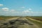 Roadway through the field. country road