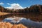 Roadway near majestic place. Gorgeous mountains in clouds. Great landscape. Woods near the lake