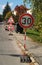 Roadwork and slowdown sign