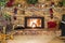 Roaring fire in a vinrage brick frieplace decorated for Christmas, with piano, rocking chair and cozy decor