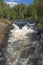 Roaring Rapids in a Narrow Channel