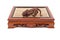 Roaring tiger figurine on chinese wooden table