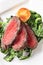 Roast beef with sauteed spinach