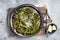 Roast Broccolini cabbage with crispy parmesan cheese. White background. Top view