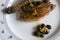 Roast guinea fowl with olives and shallots