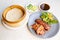 Roast Peking duck set combo with roll roti bread of traditional Cantonese yum-cha Asian gourmet cuisine