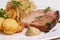 Roast pork with sauerkraut and potato