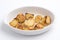 Roast potatoes in a white oven dish