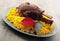 Roast shin with yellow rice with saffron