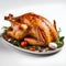 Roast turkey on a plate decorated with tomatoes vegetables, garlic. Turkey as the main dish of thanksgiving for the harvest,