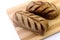 Roasted Australian bread loaf on white background. Traditionally this bread is made with chocolate powder, brown sugar and honey