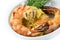 Roasted black tiger shrimps with garlic cream and dill garnish,