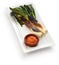 Roasted calcots with romesco sauce for dipping