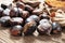 Roasted chestnuts on a rustic wooden table