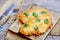 Roasted chicken breast on a cutting board and an old wooden table. Fast and easy chicken breast recipe for dinner. Rustic style