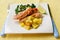 Roasted chicken breast with saute kale and squash vegetables