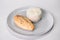 roasted chicken fillet on gray plate with boiled white rice served in culinary ring.