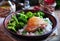 Roasted chicken with rice and broccoli, rustic style