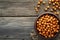 Roasted Chickpeas Snack on Rustic Wooden Background, Healthy Eating Concept