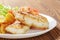Roasted codfish fillet with vegetables