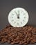 Roasted cofee and vintage clock