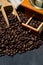 roasted coffee beans and accessories, concept photo, vertical