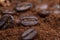 roasted coffee beans and a bunch of ground natural coffee