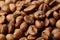 Roasted coffee beans close up. Espresso dark, aroma, black caffeine drink.