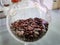 Roasted Coffee Beans Inside Spherical Glass Container with Selective Focus