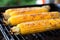 roasted corn on the cob at a summer festival