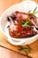 Roasted duck legs with rosemary sprigs