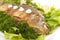 Roasted fish with fresh herbs and lemon. Selective focus