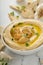 Roasted garlic hummus topped with olive oil