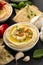 Roasted garlic hummus topped with olive oil