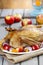 Roasted goose with apples and vegetables