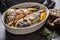 Roasted mediterranean fish bream with potatoes rosemary and lemon
