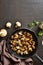 Roasted mushroom in cast iron pan