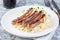 Roasted nuremberg sausages served with sour cabbage and mashed potatoes, horizontal