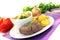 Roasted ostrich steaks with baked potatoes