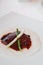 Roasted Peking duck crispy skin with sweet sauce on thin pancake wrap