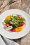 Roasted pepper salad with calamari and fresh greens