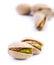 Roasted pistachios on a white background