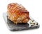 Roasted pork on gray cutting board