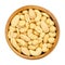 Roasted and salted mixed nuts, snack food in a wooden bowl