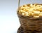 Roasted salted raw cashew nuts in wooden bowl on rustic table, healthy vegetarian snack, Anacardium occidentale, Cashews on white