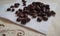 Roasted scattered coffee beans brown aromatic Arabica